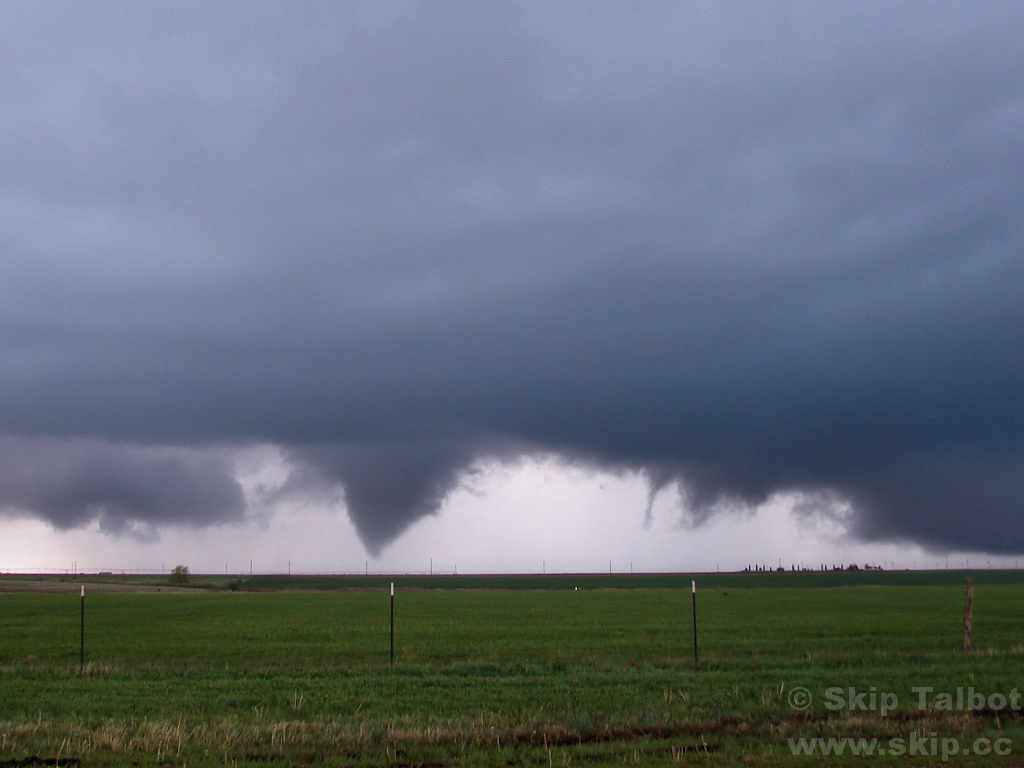 A cone shaped tornado (left) and a rope funnel (right)
